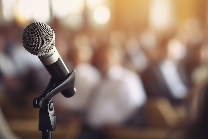 /media/sizhdiw0/freepik_close-up-microphone-speech-official-event_ai